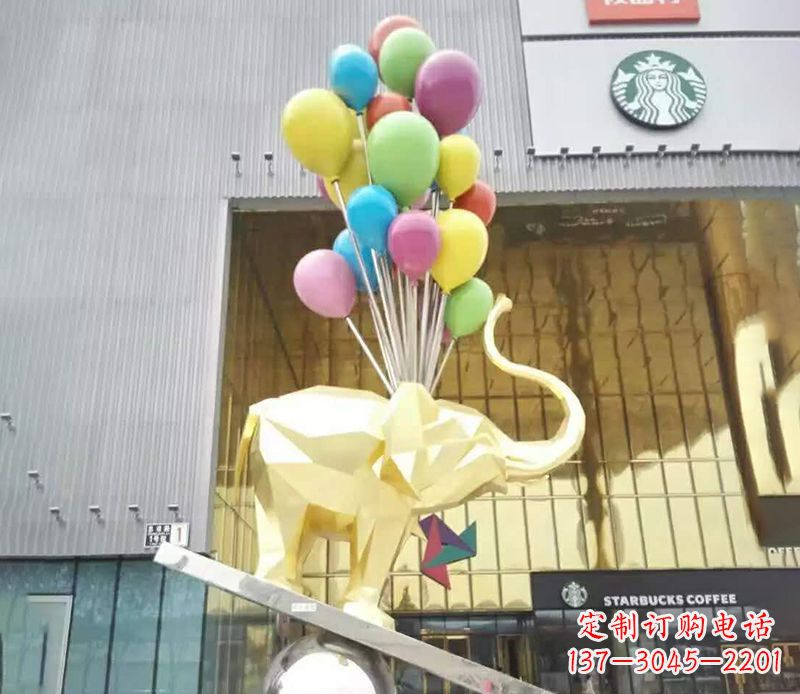 大连不锈钢踩球的小象雕塑