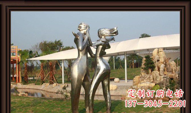 大连一对动感传情的不锈钢跳舞情侣雕塑