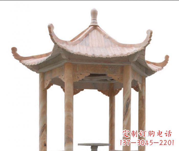大连美丽而优雅的公园晚霞红六角石凉亭雕塑