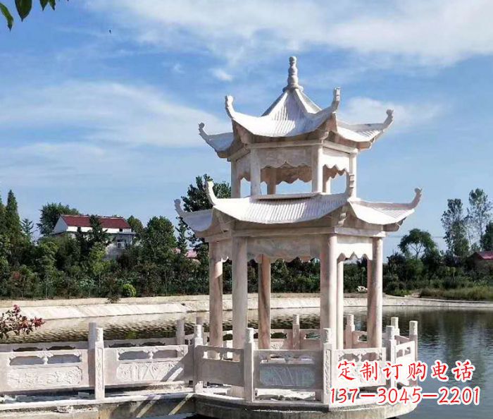 大连海边景观晚霞红石雕凉亭