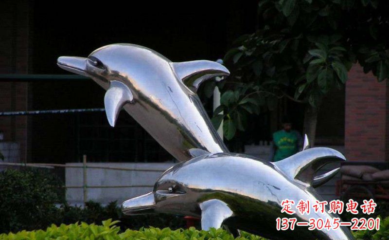 大连彰显自由灵动的不锈钢跳跃海豚雕塑