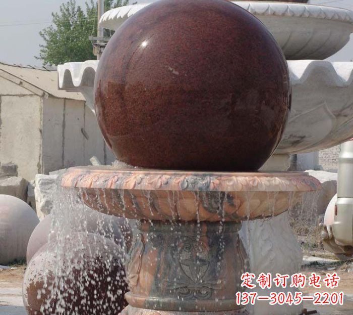 大连石来运转小型风水球喷泉石雕