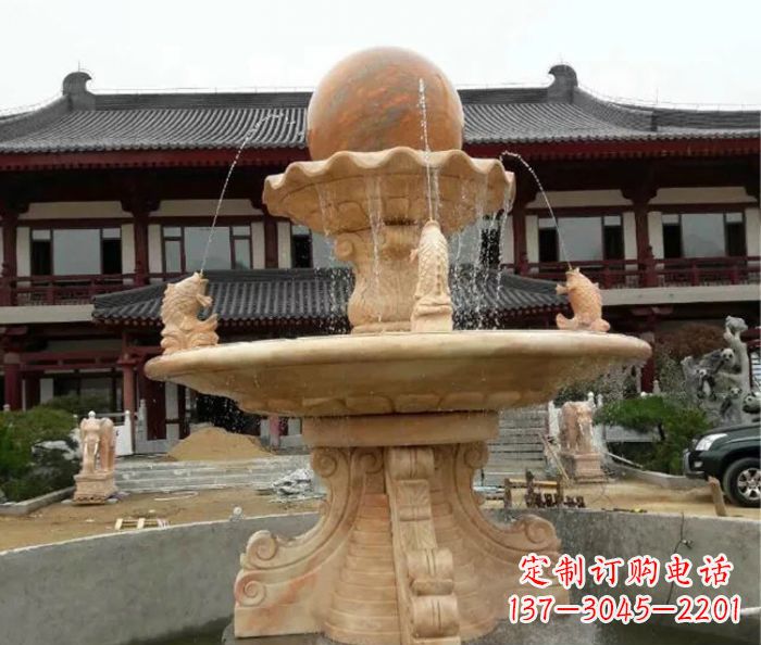 大连双层风水球喷泉晚霞红石雕