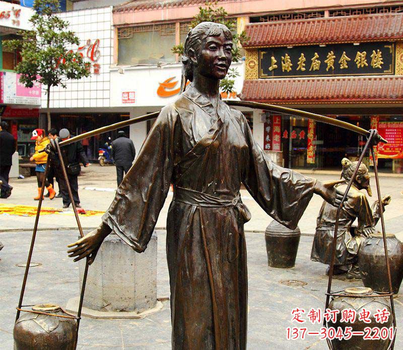 大连挑着罐子的古代女人铜雕