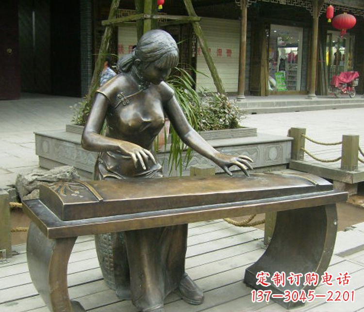 大连铜雕现代人物弹古筝雕塑