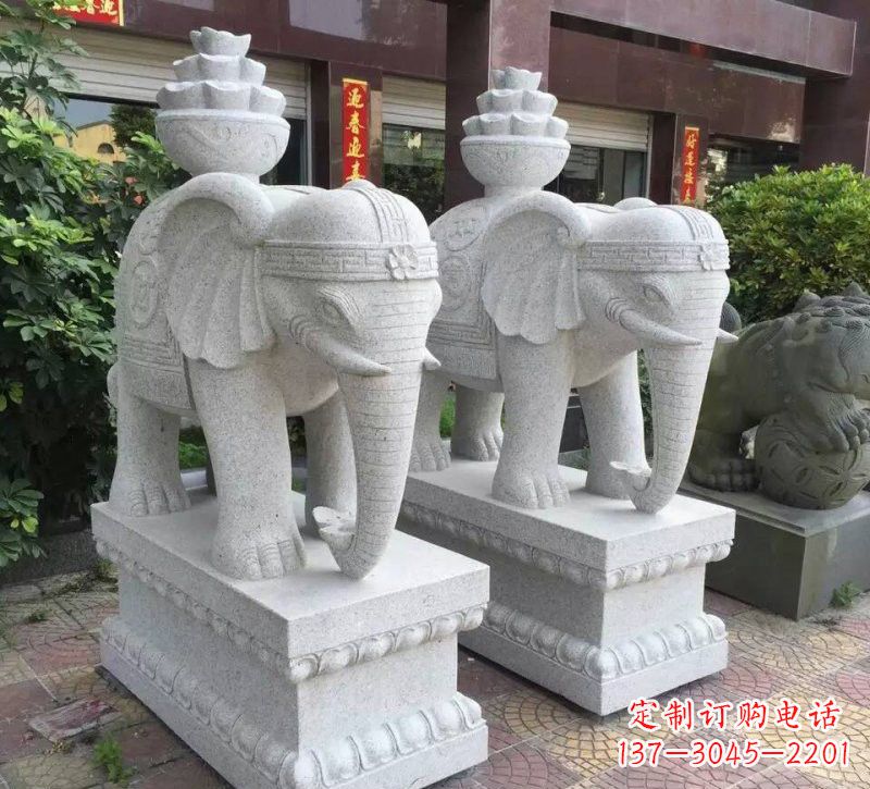 大连驮元宝的大象石雕