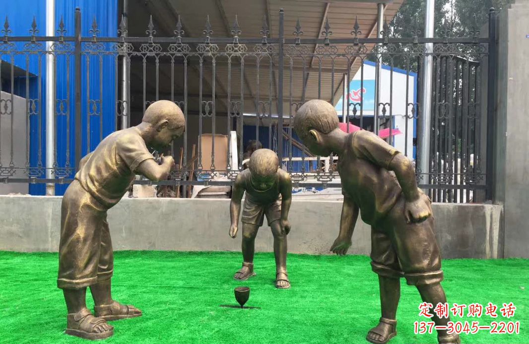 大连玩陀螺儿童铜雕塑