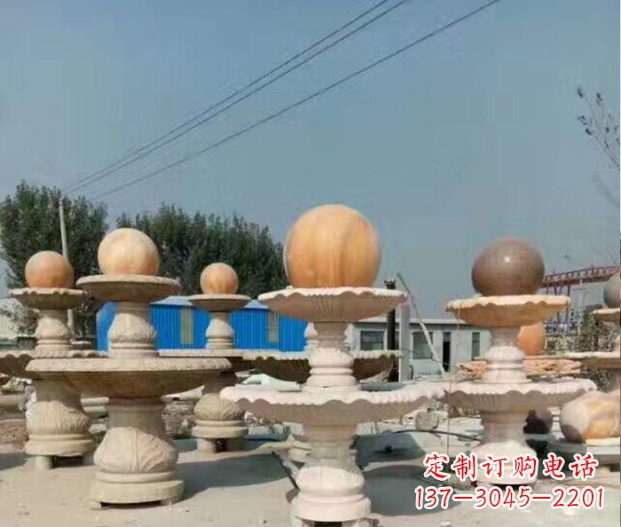 大连晚霞红多层风水球喷泉石雕