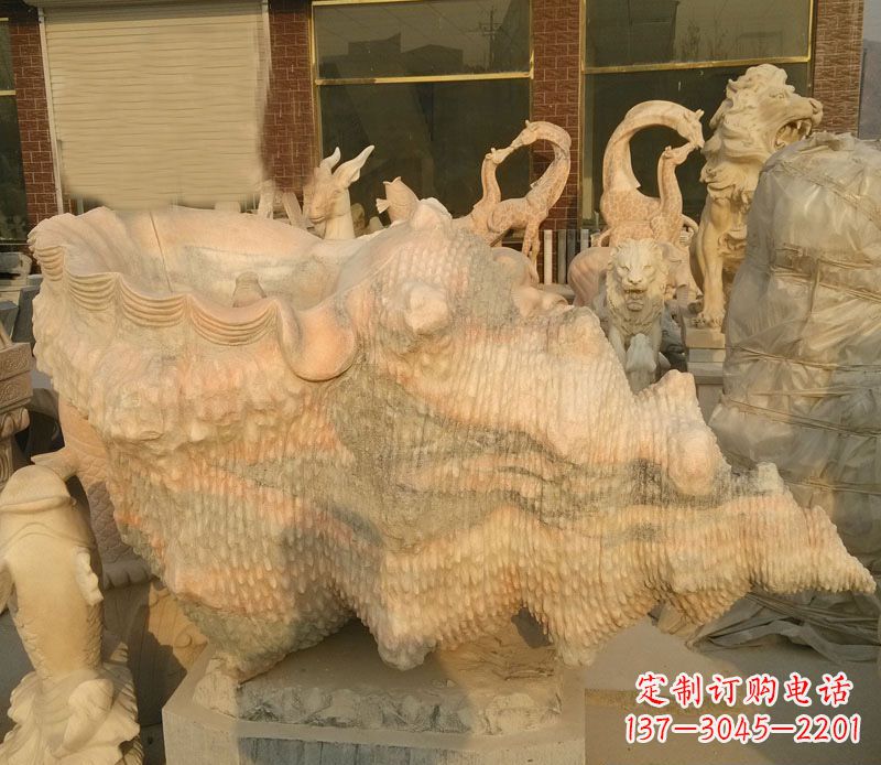 大连晚霞红海螺石雕