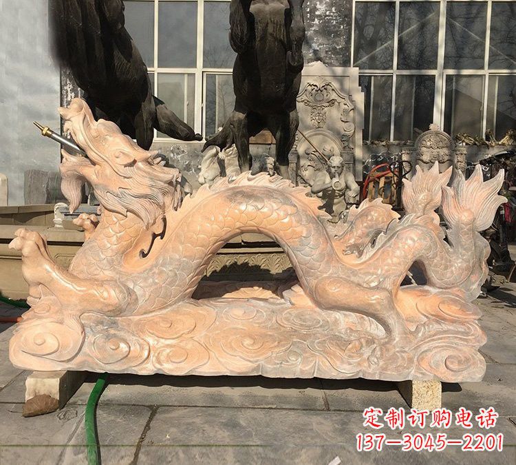 大连晚霞红石雕喷水龙