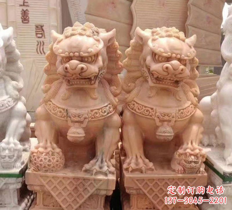 大连晚霞红石雕狮子