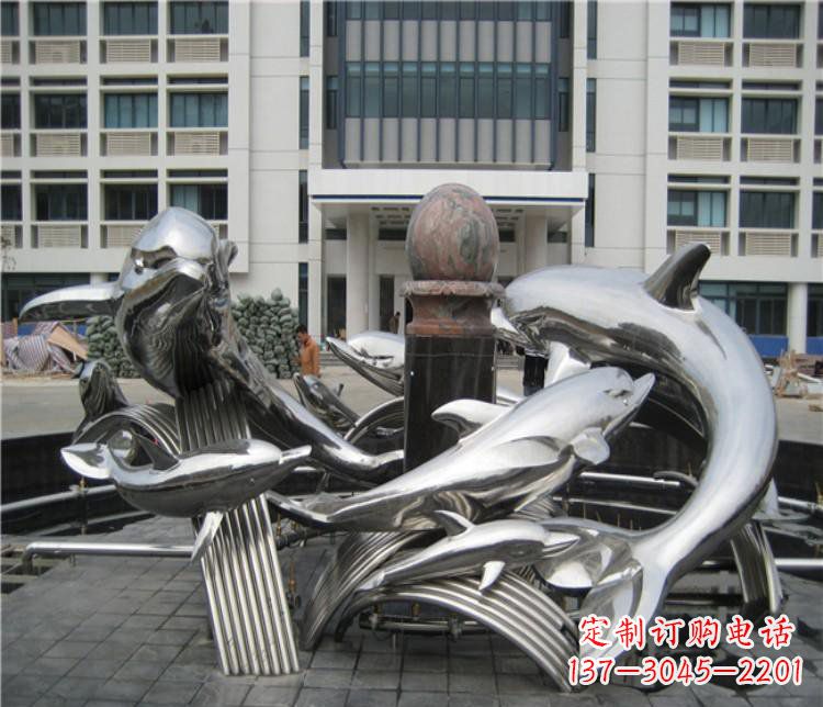 大连校园不锈钢海豚海浪雕塑