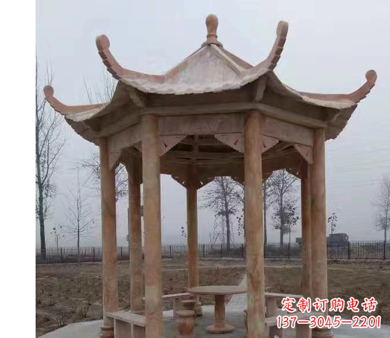 大连公园晚霞红八角石雕凉亭